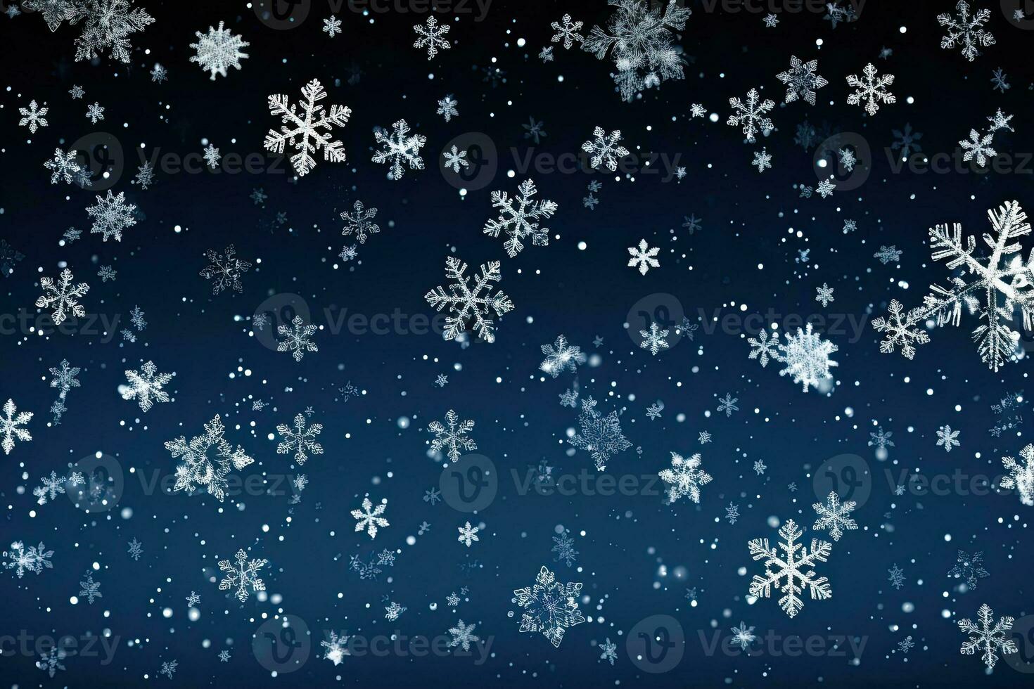 falling snowflakes and ice flakes on a dark night winter background photo