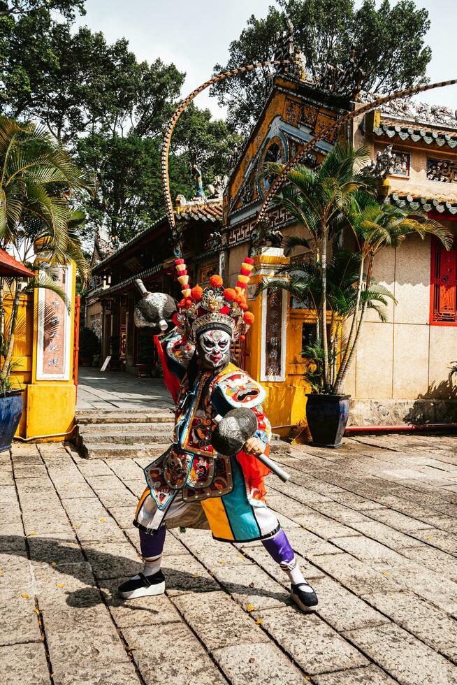 Ho Chi Minh City, Vietnam - August 19, 2023 Artists performing Vietnamese classical opera make up for the show in Binh Thanh District photo