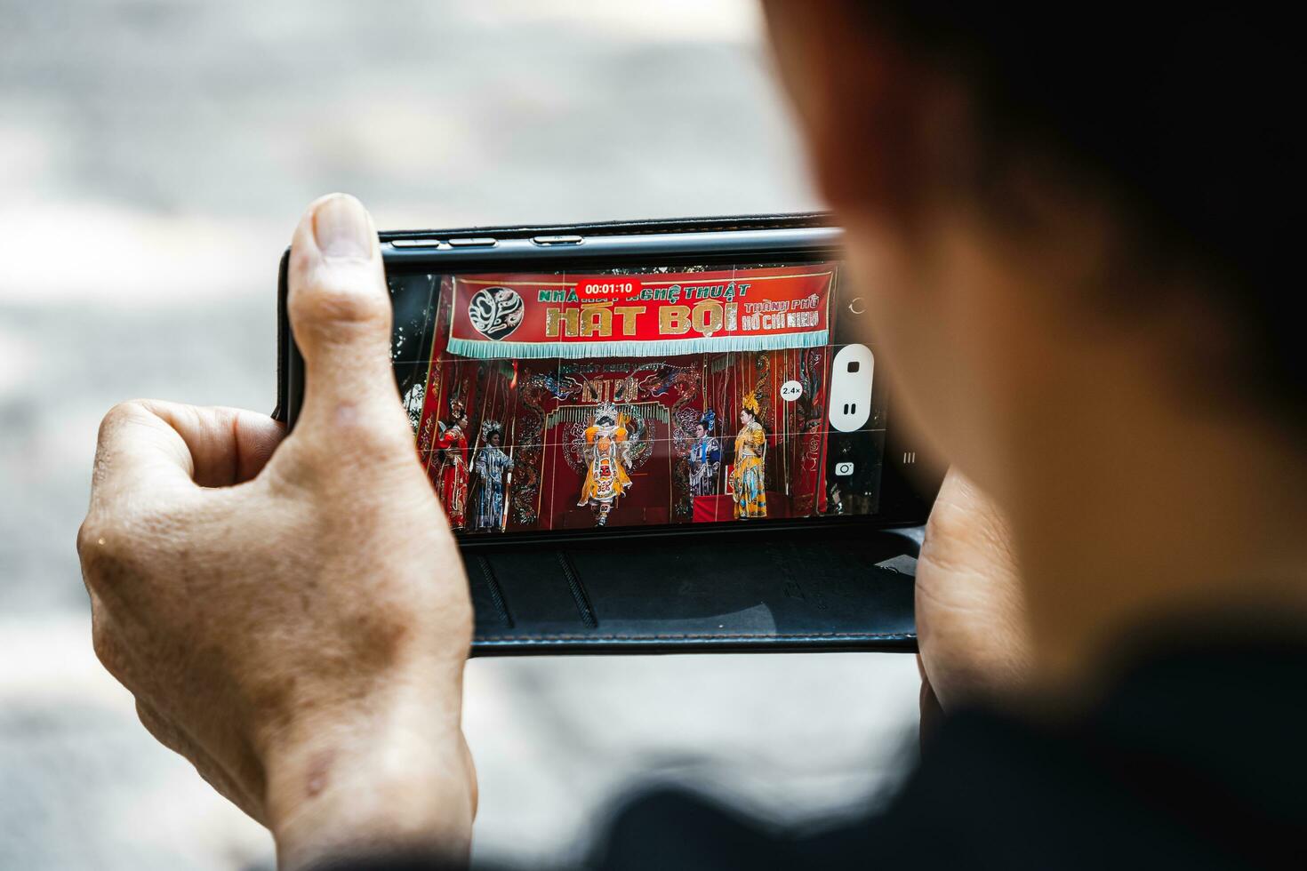Ho Chi Minh City, Vietnam - August 19, 2023 Artists performing Vietnamese classical opera make up for the show in Binh Thanh District photo