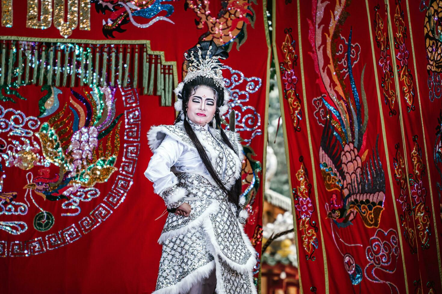 Ho Chi Minh City, Vietnam - August 19, 2023 Artists performing Vietnamese classical opera as know as Hat Boi in Binh Thanh District photo
