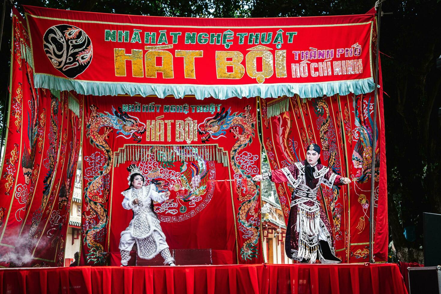 Ho Chi Minh City, Vietnam - August 19, 2023 Artists performing Vietnamese classical opera as know as Hat Boi in Binh Thanh District photo