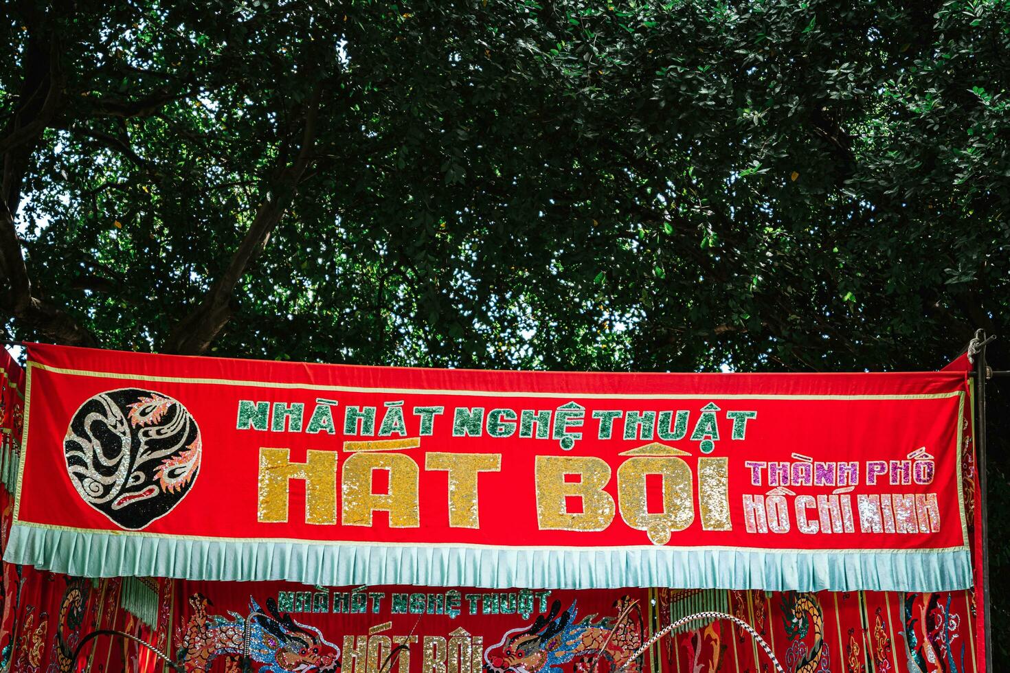 Ho Chi Minh City, Vietnam - August 19, 2023 Artists performing Vietnamese classical opera as know as Hat Boi in Binh Thanh District photo
