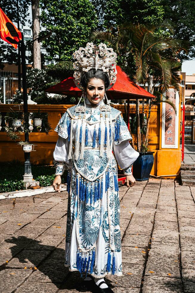 Ho Chi Minh City, Vietnam - August 19, 2023 Artists performing Vietnamese classical opera make up for the show in Binh Thanh District photo
