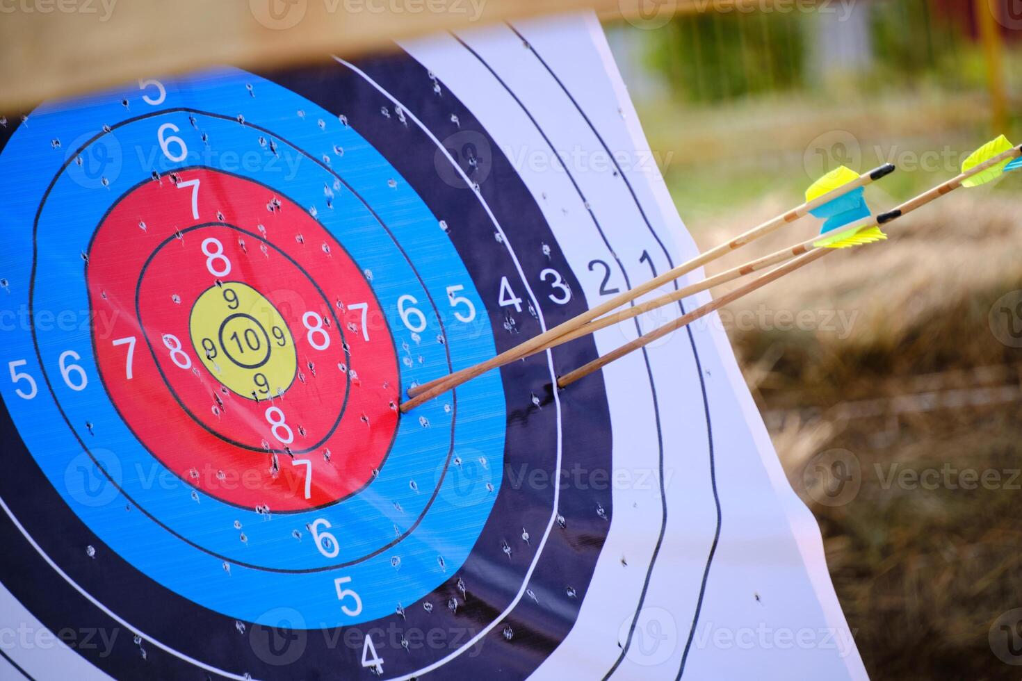 archery-targets-with-arrows-stuck-in-33524547-stock-photo-at-vecteezy