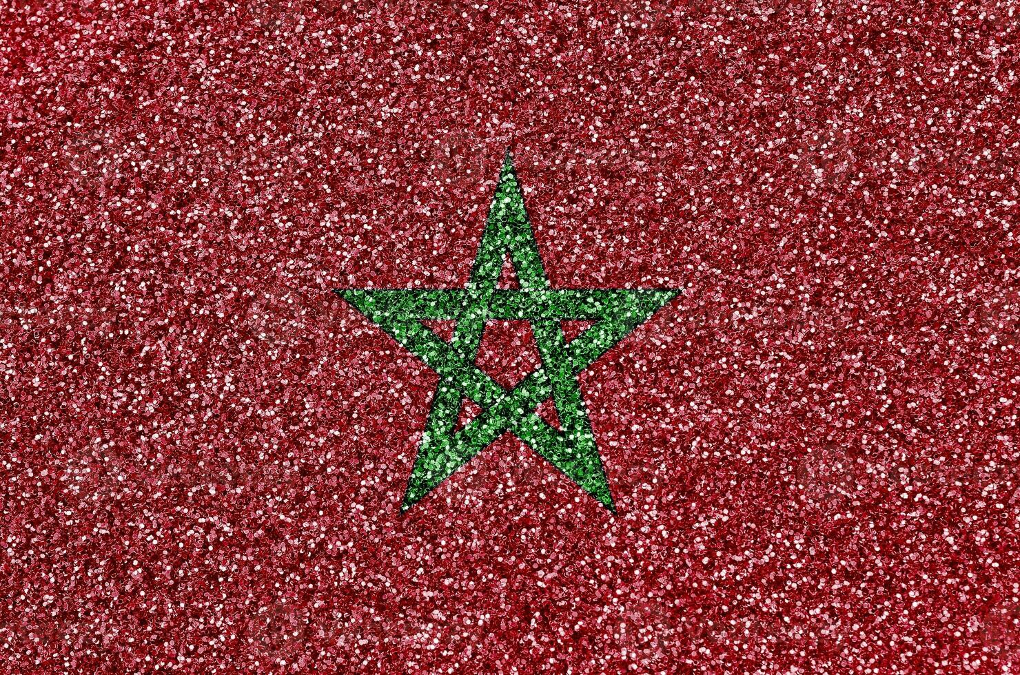 Morocco flag depicted on many small shiny sequins. Colorful festival background for party photo