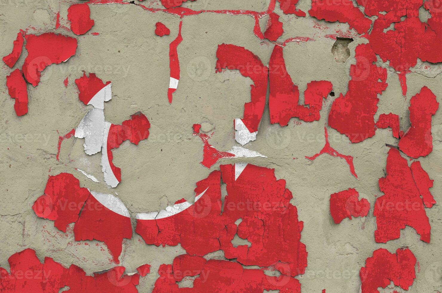 Turkey flag depicted in paint colors on old obsolete messy concrete wall closeup. Textured banner on rough background photo