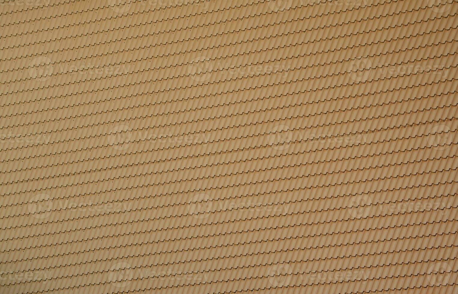 The texture of the roof of painted metal. Close-up detailed view of roof covering for pitched roof. High quality roofing photo