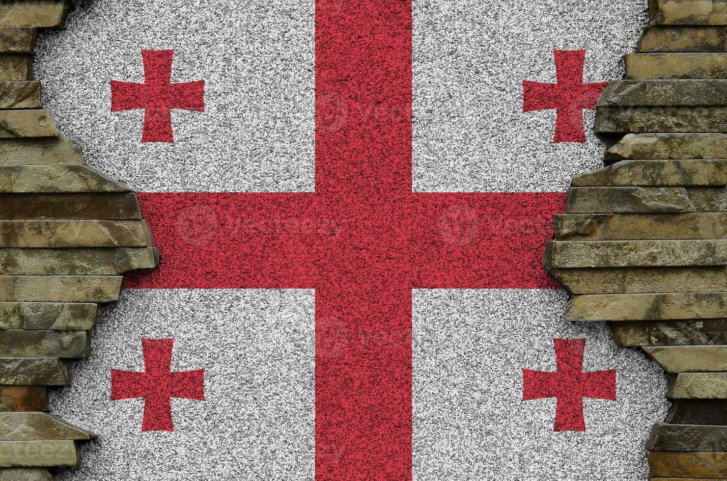 Georgia flag depicted in paint colors on old stone wall closeup. Textured banner on rock wall background photo