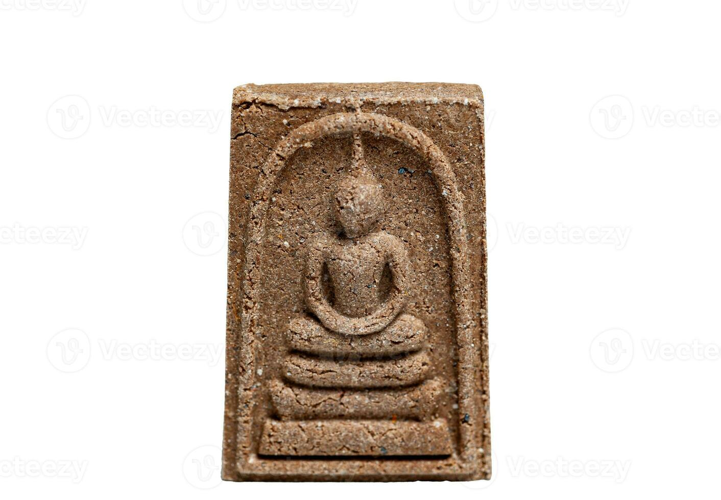 Buddha amulets are made from Thai amulets clay isolated on a white background. photo
