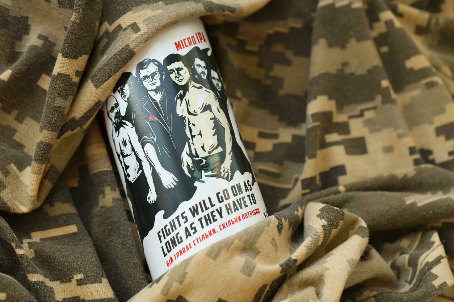 KYIV, UKRAINE - MAY 4, 2022 Localy brewed beer called Fights will go on as long as they have to photo