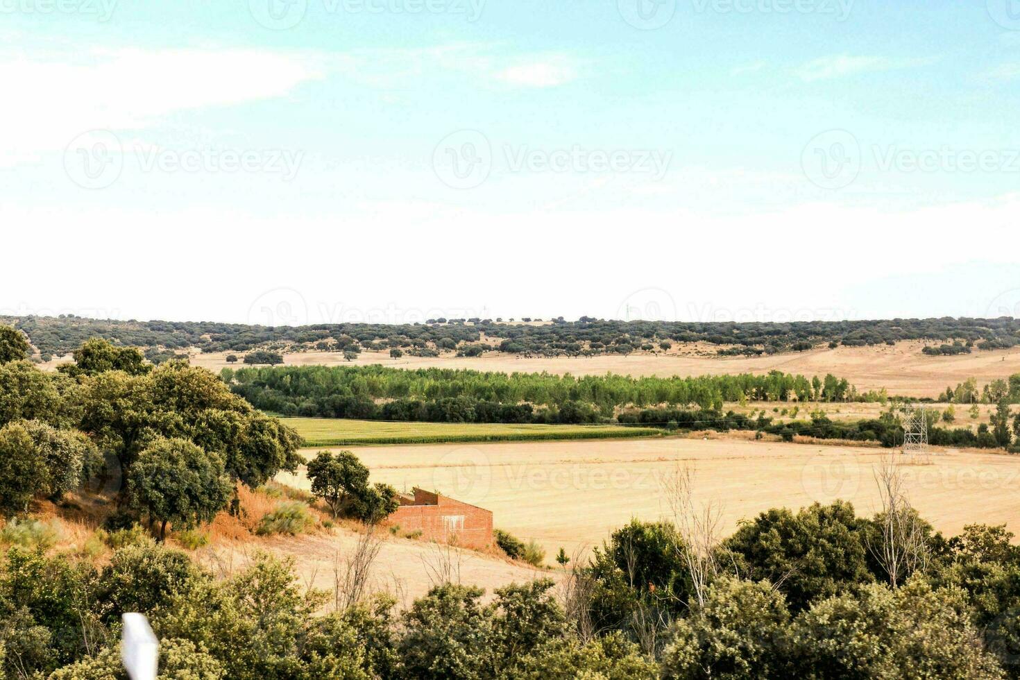 a view of the countryside from a hilltop photo