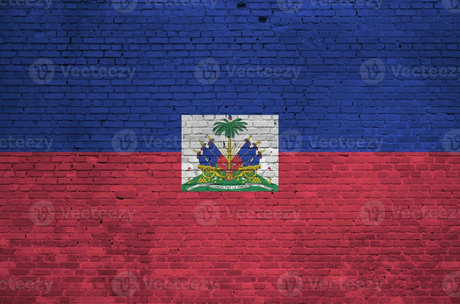 Haiti flag depicted in paint colors on old brick wall. Textured banner on big brick wall masonry background photo