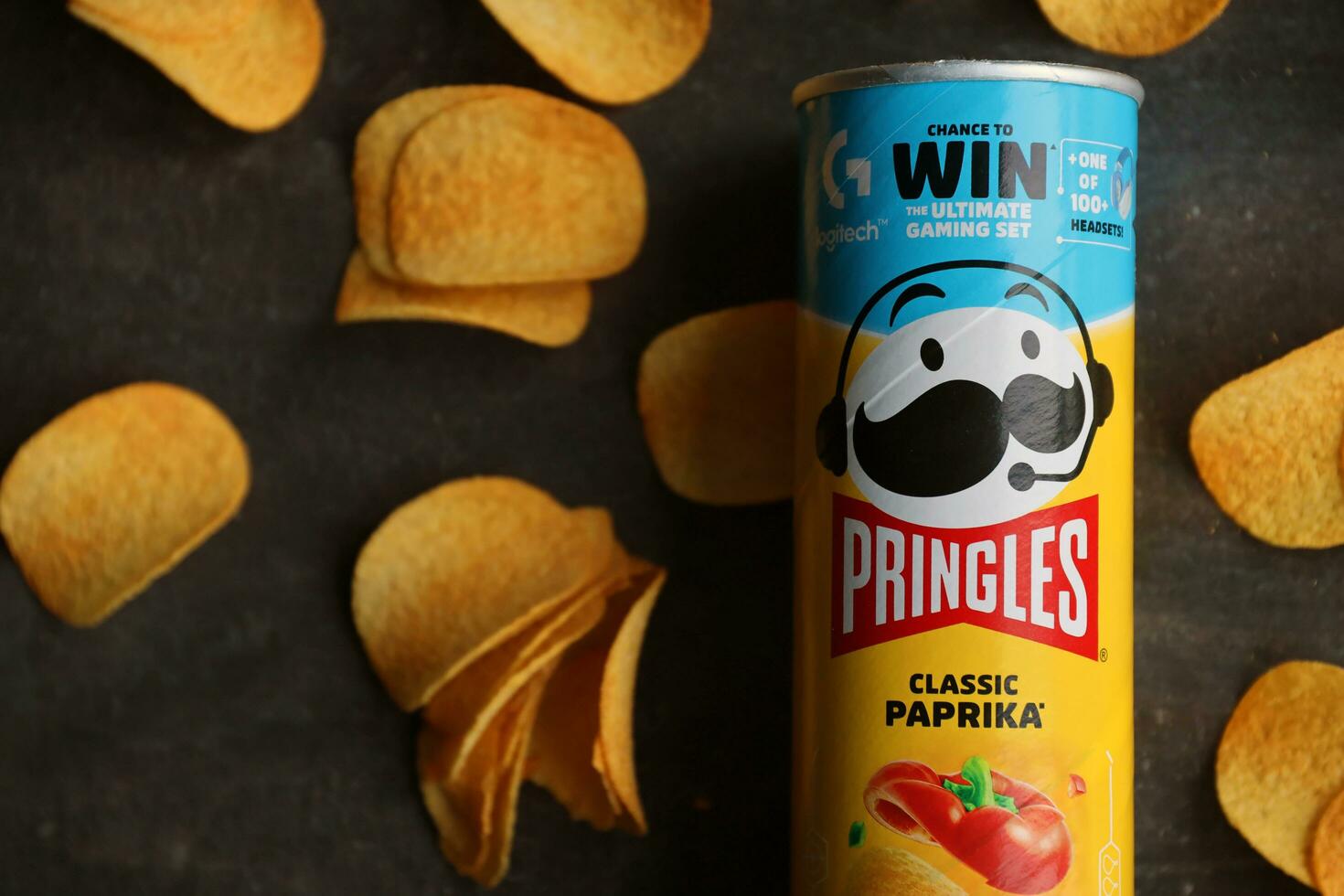 KYIV, UKRAINE - 4 MAY, 2023 Pringles tube of chips with rare classic paprika flavour photo