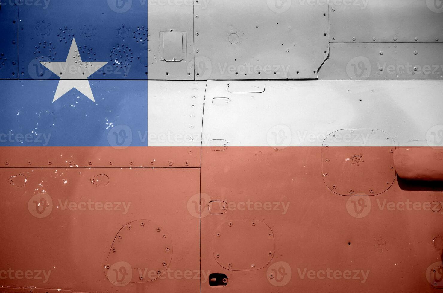 Chile flag depicted on side part of military armored helicopter closeup. Army forces aircraft conceptual background photo