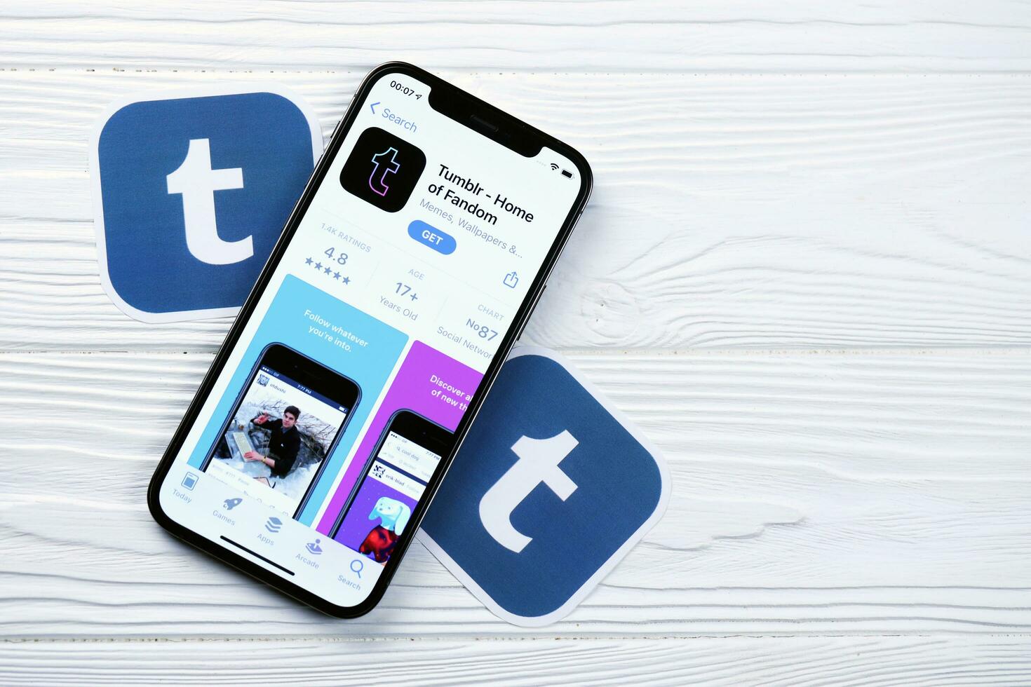 KHARKOV, UKRAINE - MARCH 5, 2021 Tumblr icon and application from App store on iPhone 12 pro display screen on white table photo