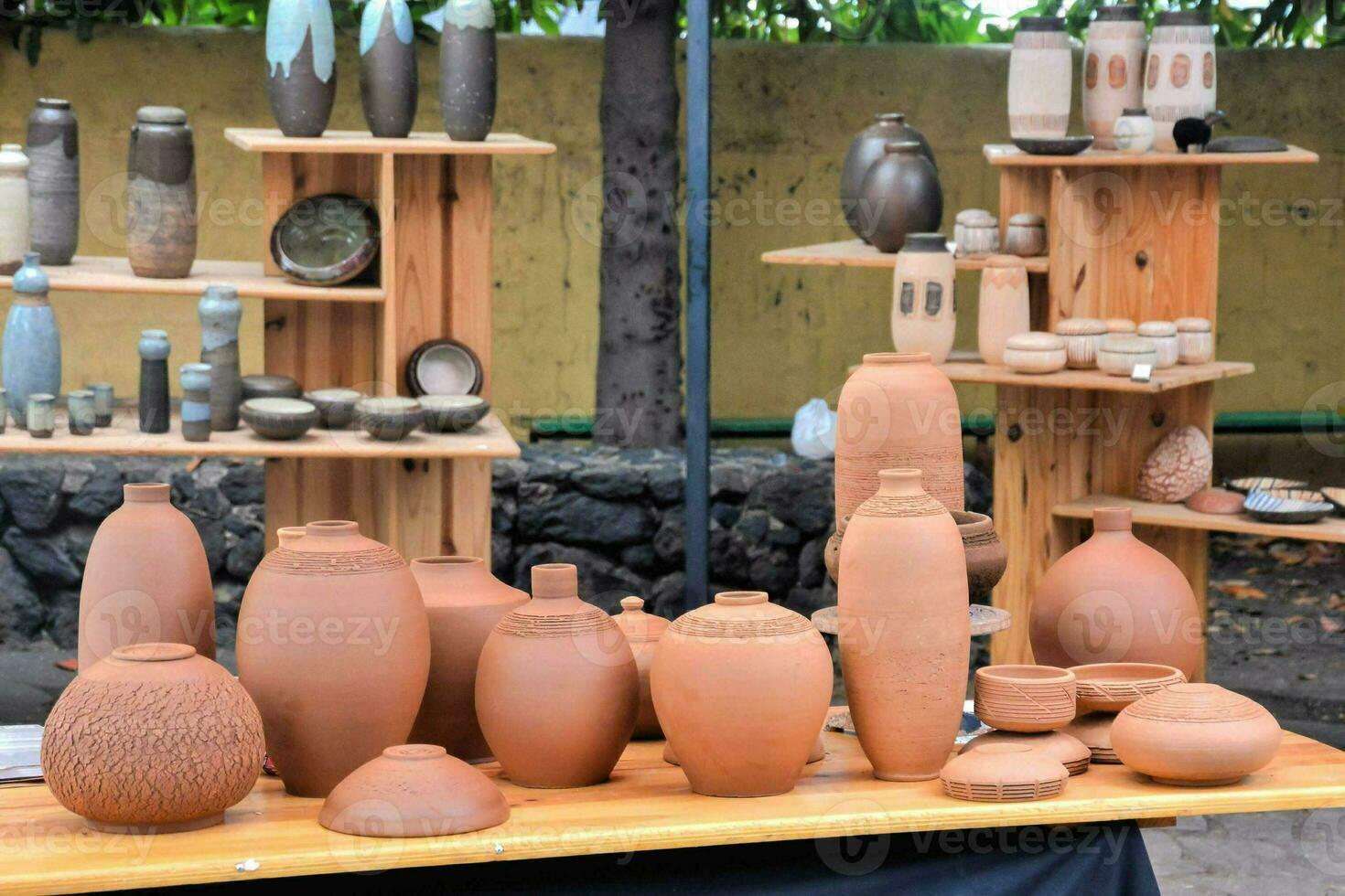 a table with many different types of pottery 33552250 Stock Photo at