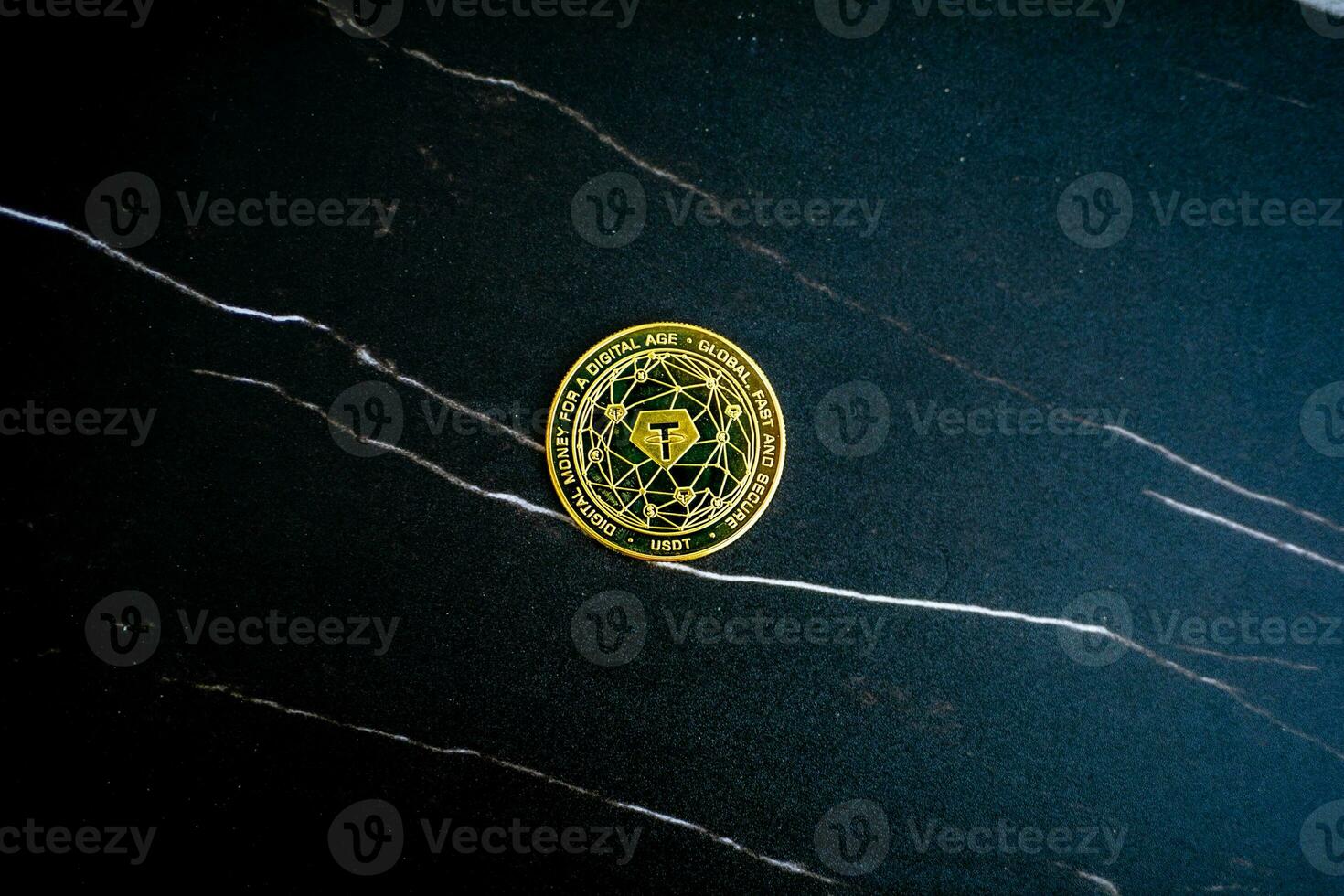 Tether coin USDT on black marble texture. photo