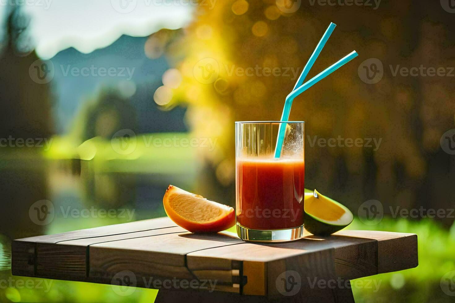 un vaso de jugo con un Paja en un mesa. generado por ai foto