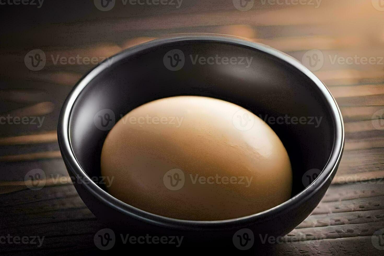 an egg in a black bowl on a wooden table. AI-Generated photo