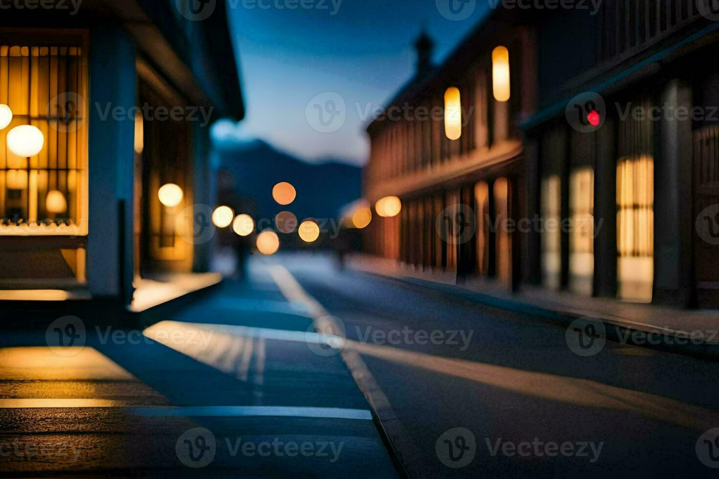 a street at night with lights on the buildings. AI-Generated photo