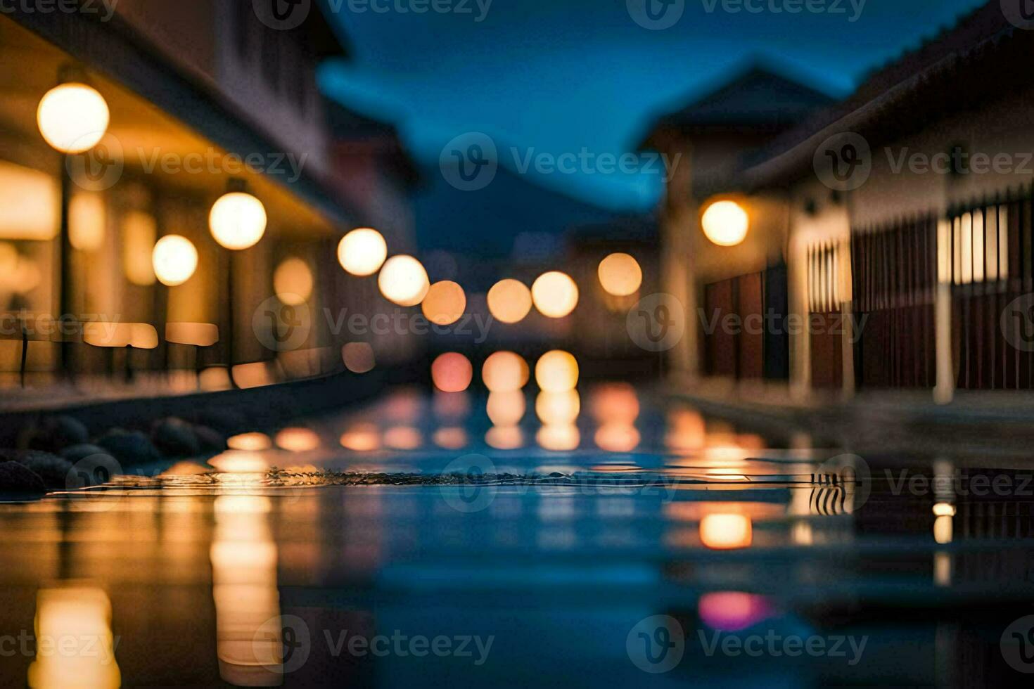 a street at night with lights on the buildings. AI-Generated photo
