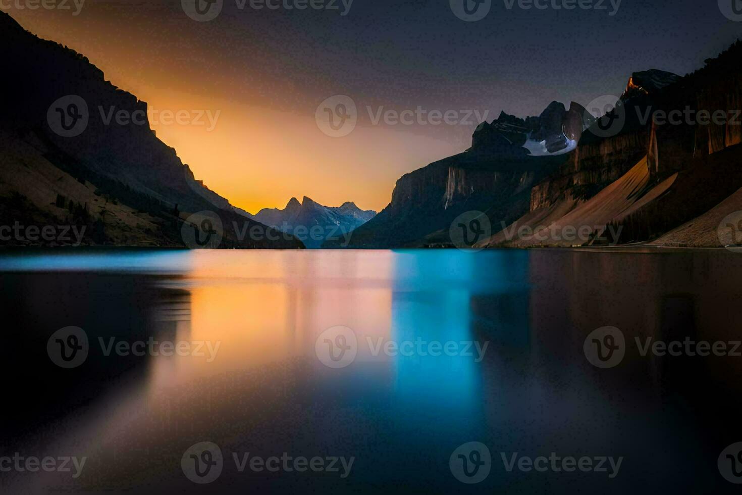 the sun sets over a mountain range and a lake. AI-Generated photo