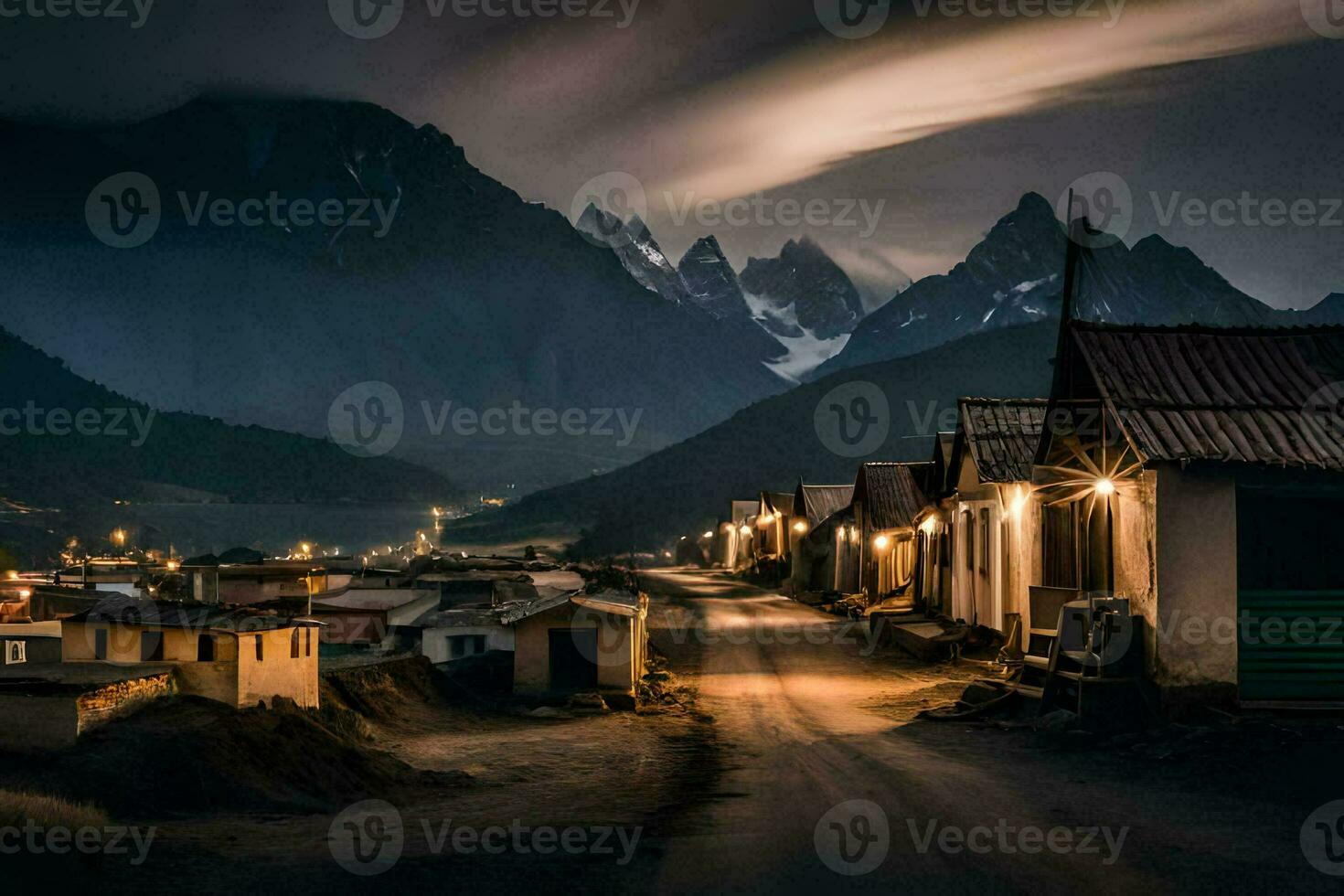 a street in the middle of a mountain town at night. AI-Generated photo