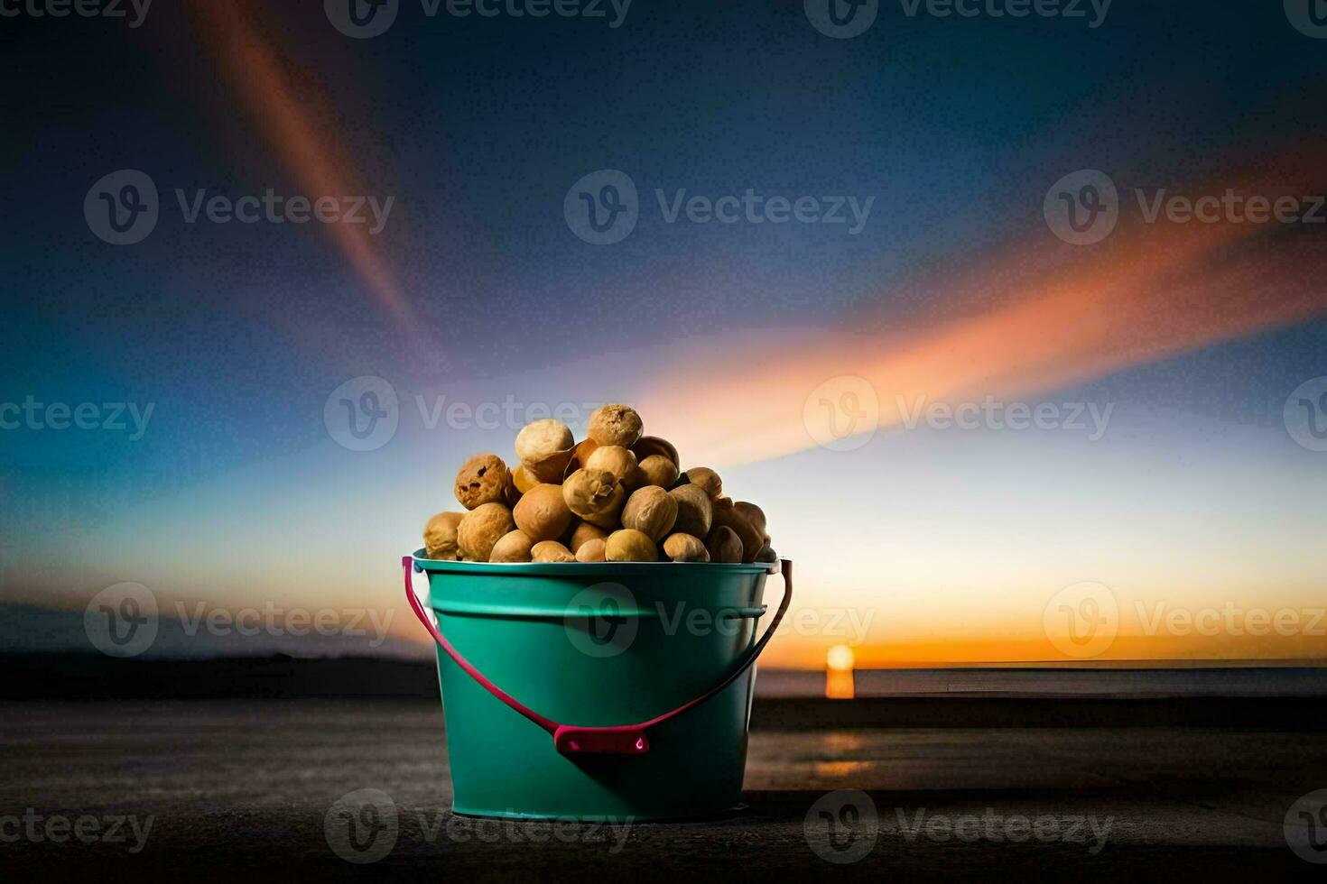 a bucket of nuts on the beach at sunset. AI-Generated photo