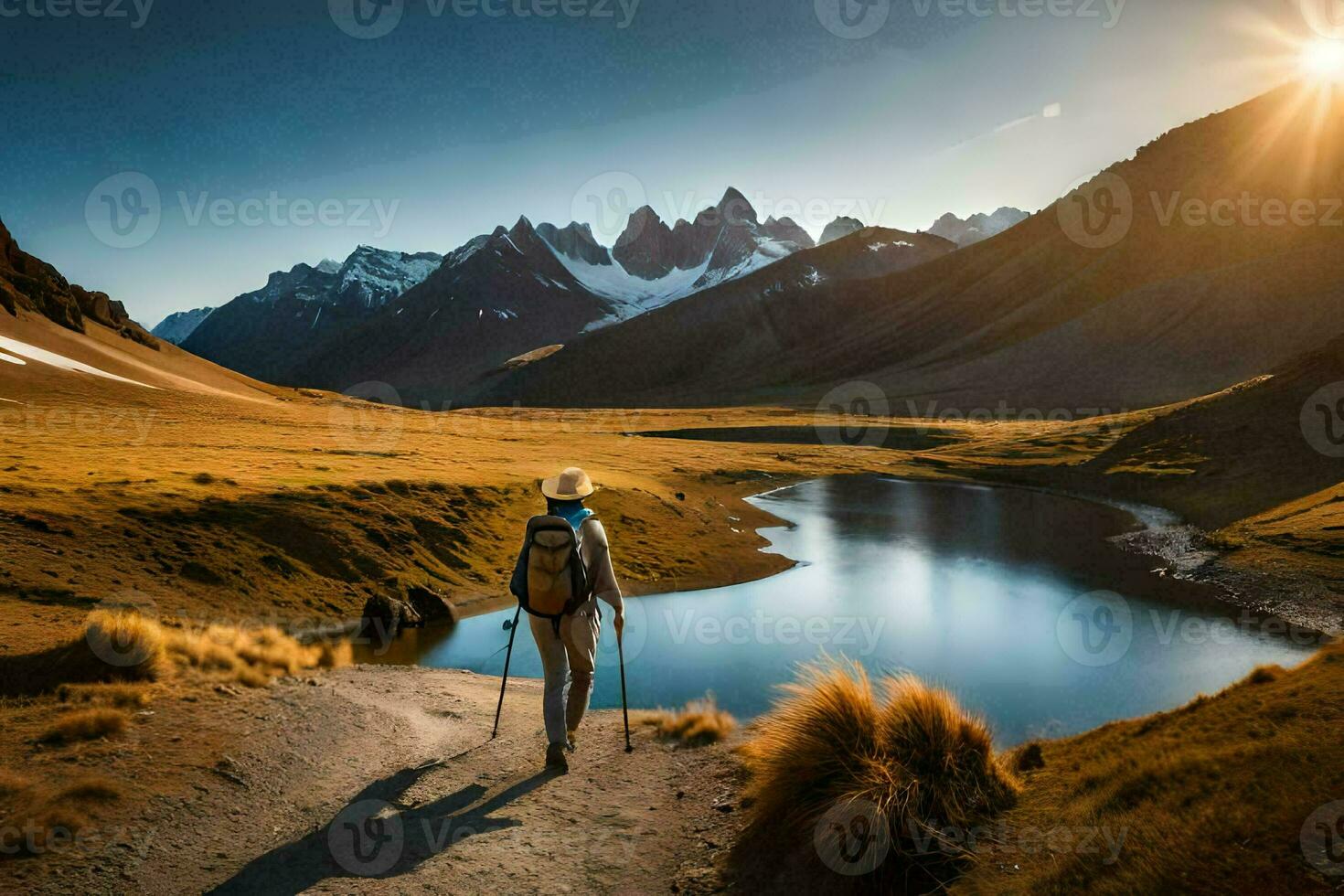 un hombre camina mediante el montañas a puesta de sol. generado por ai foto
