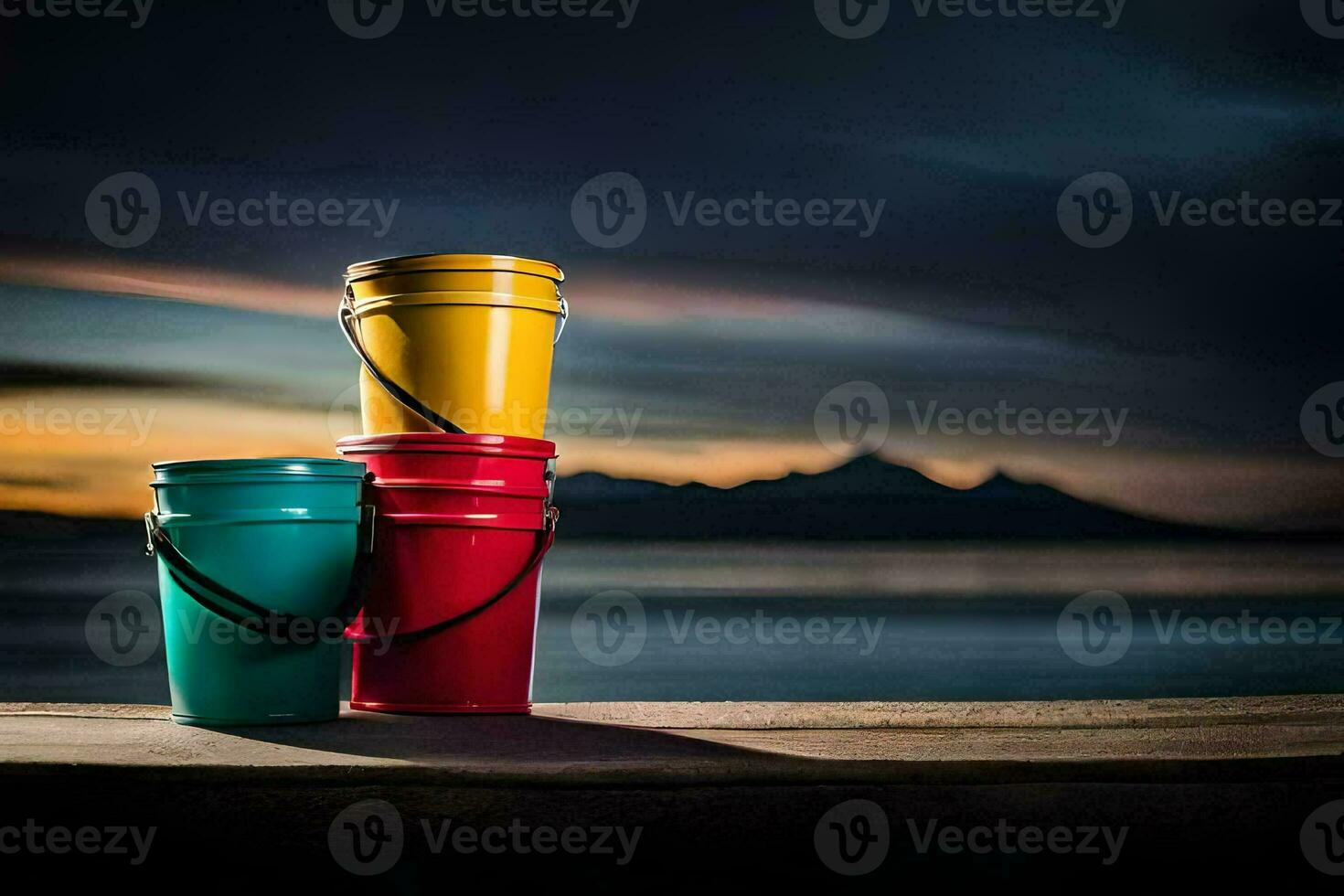 three colorful buckets sit on a wooden table near the ocean. AI-Generated photo