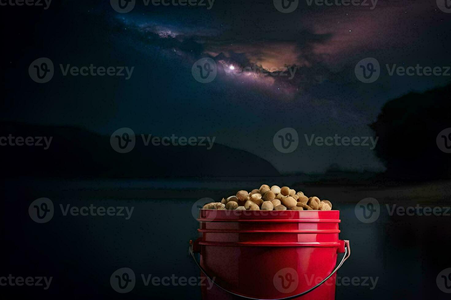 a bucket full of peanuts on a lake at night. AI-Generated photo