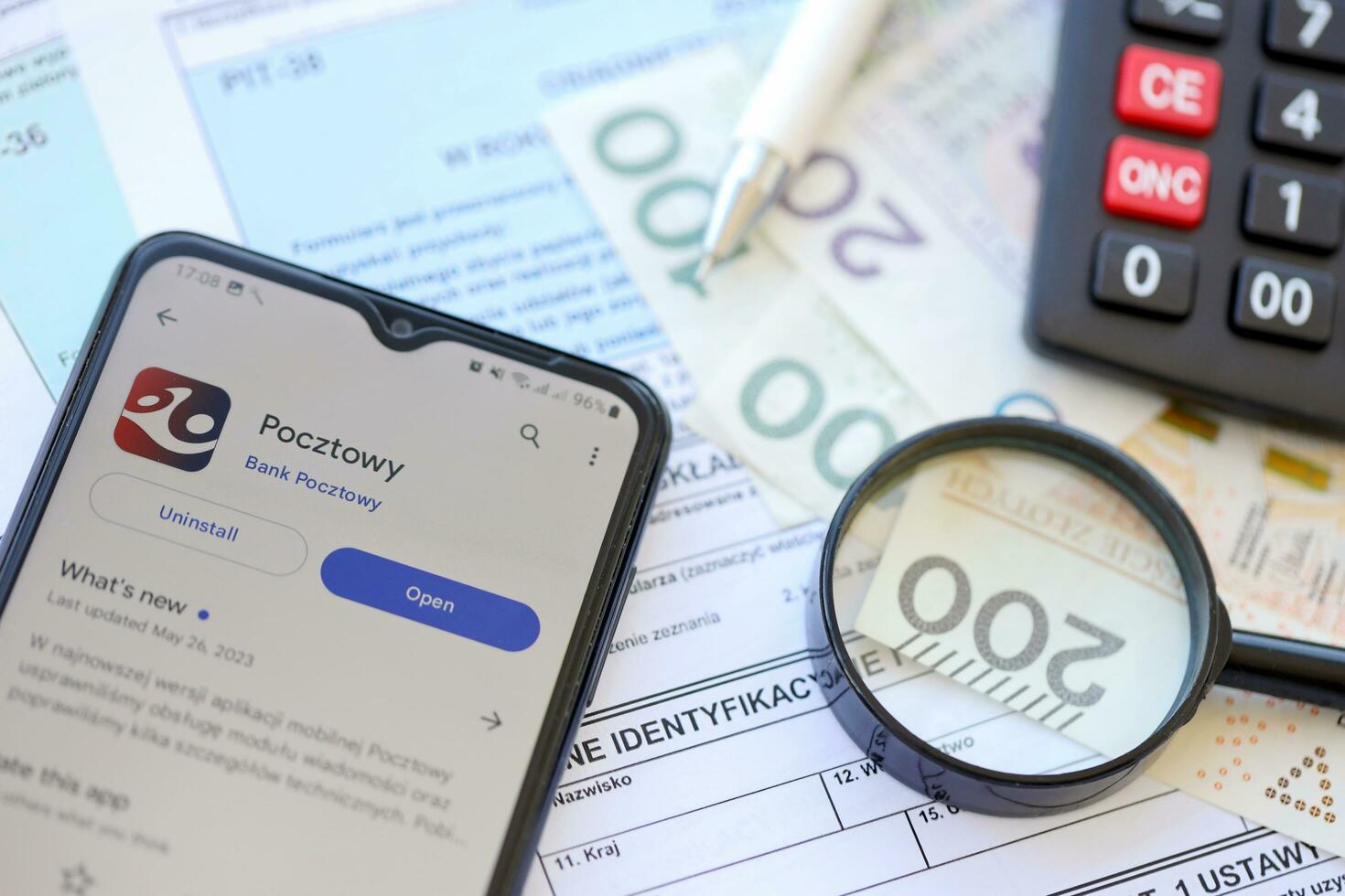 TERNOPIL, UKRAINE - AUGUST 3, 2023 Pocztowy bank application on screen on modern smartphone. Official app of famous polish bank photo