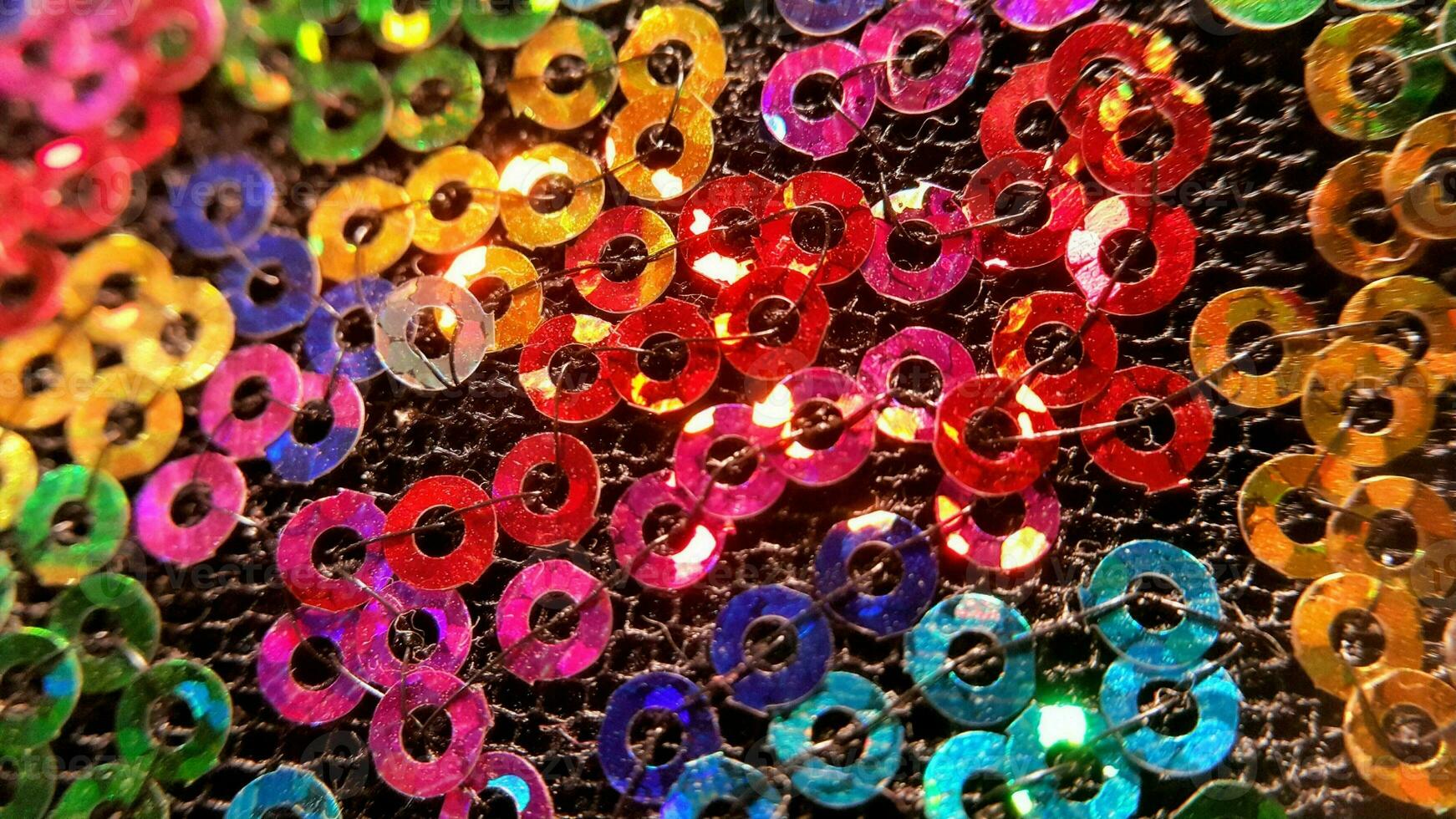Close up view of colorful and shiny beads photo