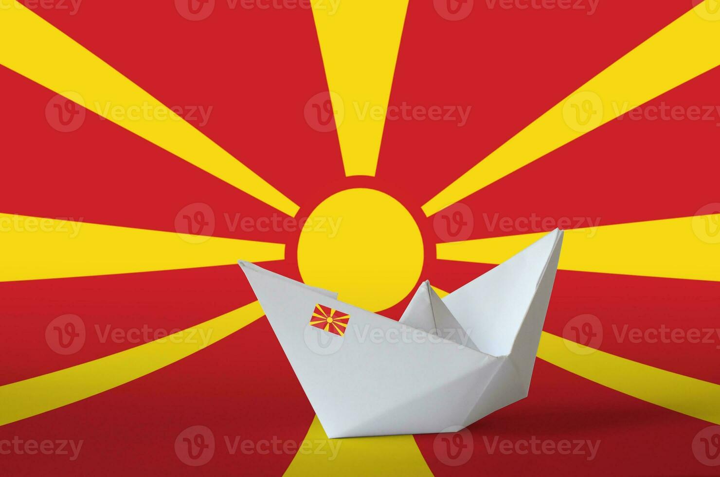 Macedonia flag depicted on paper origami ship closeup. Handmade arts concept photo