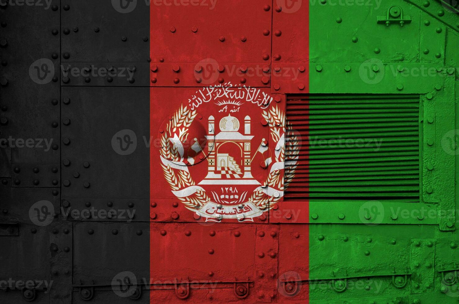 Afghanistan flag depicted on side part of military armored tank closeup. Army forces conceptual background photo