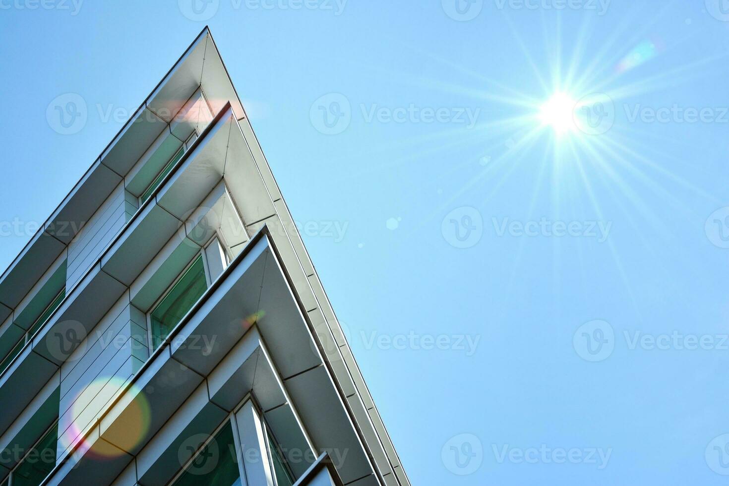 Urban abstract - windowed wall of office building. Detail shot of modern business building in city. photo
