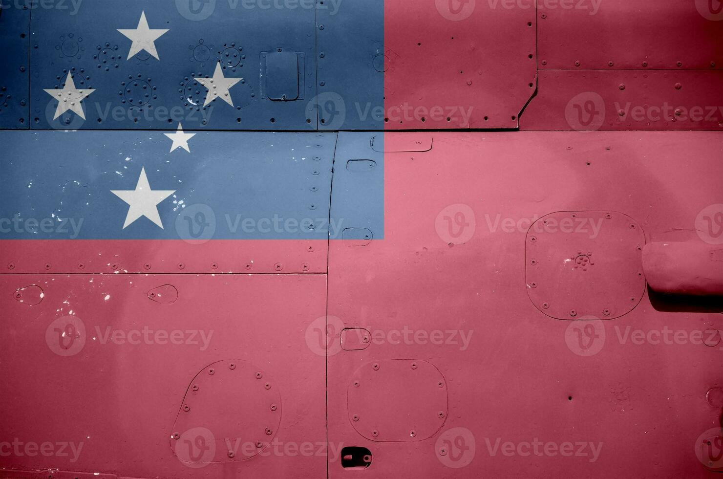 Samoa flag depicted on side part of military armored helicopter closeup. Army forces aircraft conceptual background photo