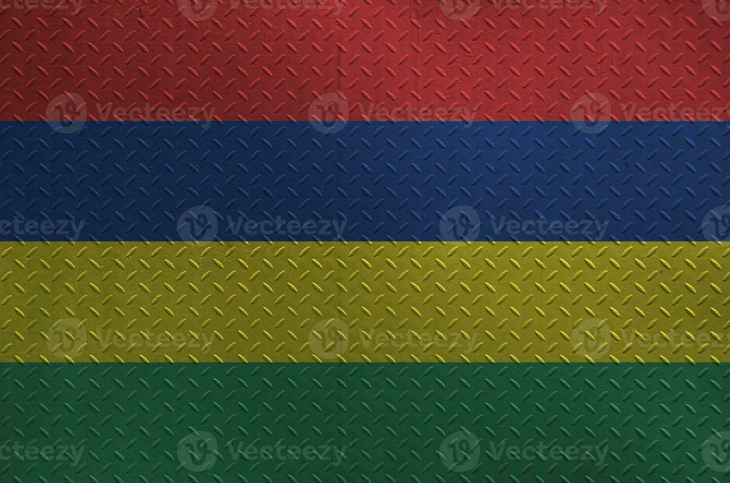 Mauritius flag depicted in paint colors on old brushed metal plate or wall closeup. Textured banner on rough background photo