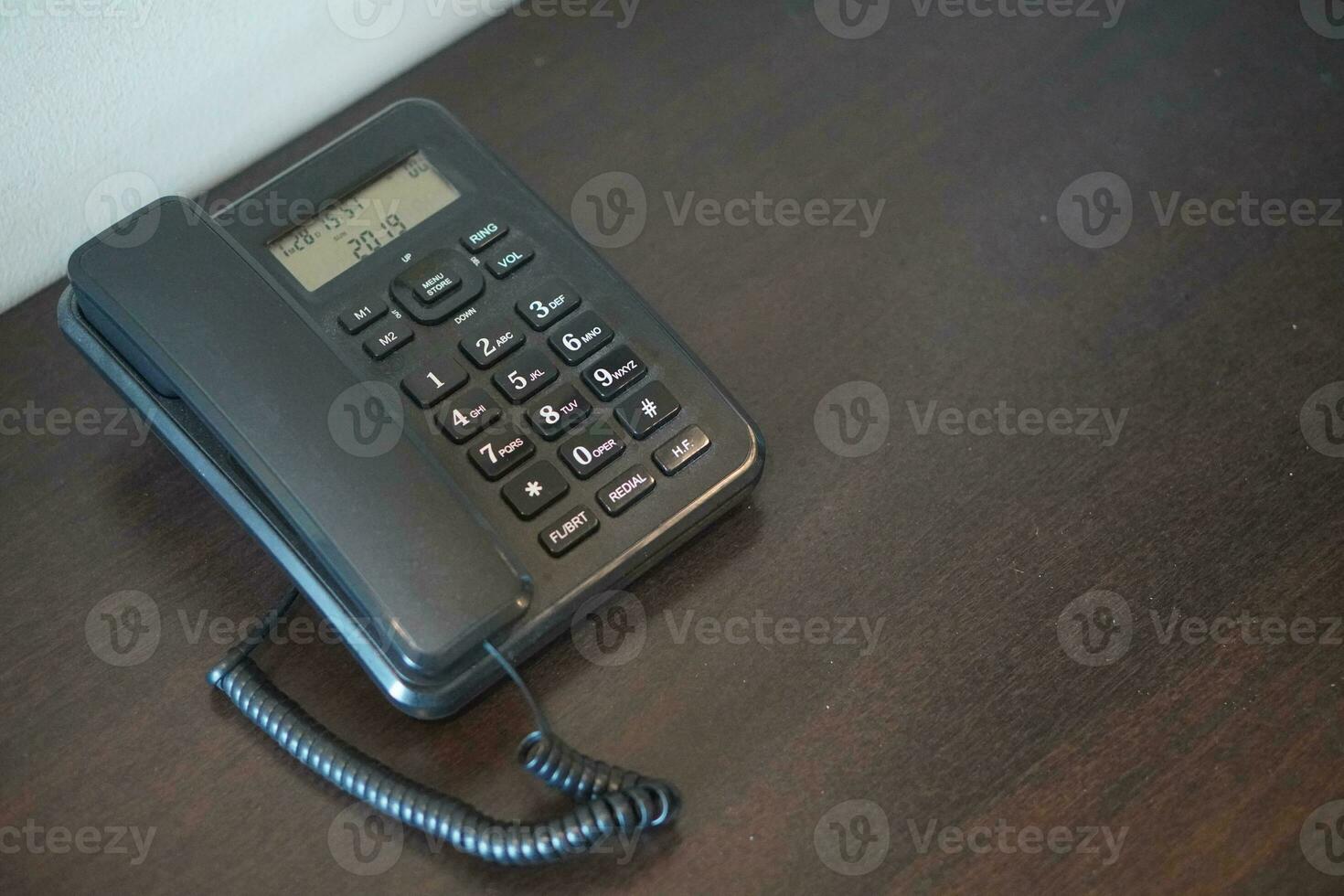 black and white number plastic telephone on wooden table,cement wall background, object, technology, copy space photo