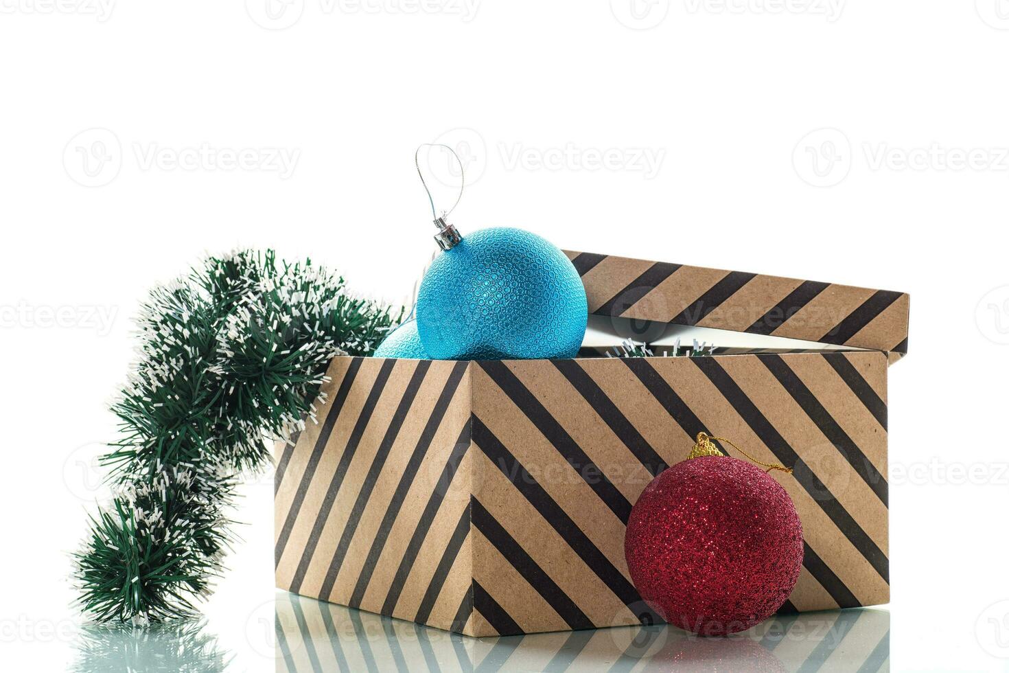 Christmas card . New Year's colorful toys in a box with decorations. photo