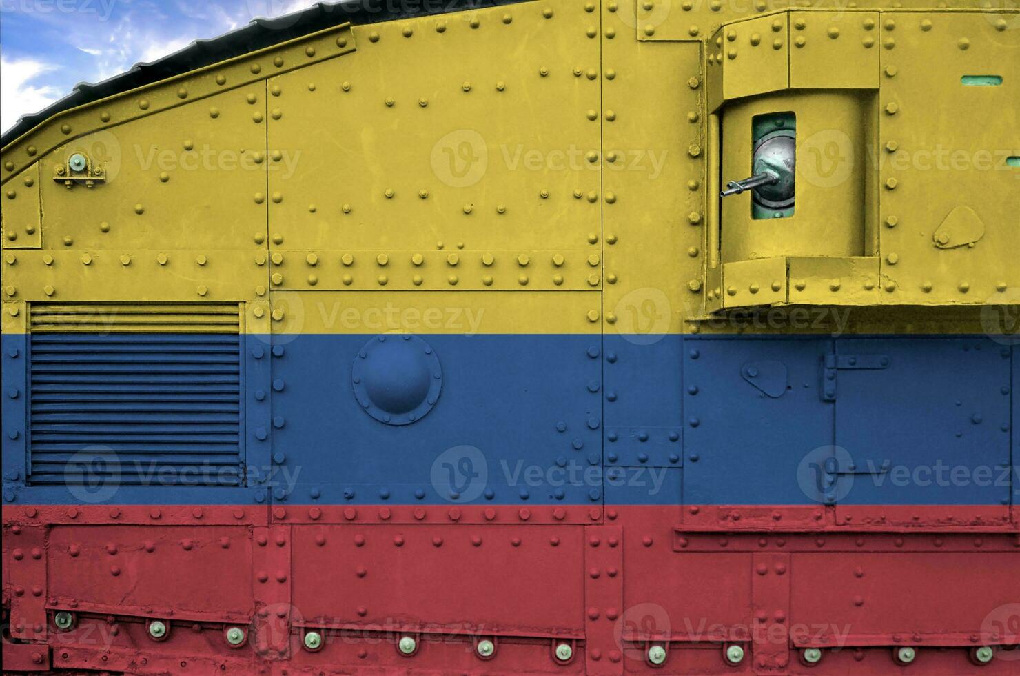 Colombia flag depicted on side part of military armored tank closeup. Army forces conceptual background photo