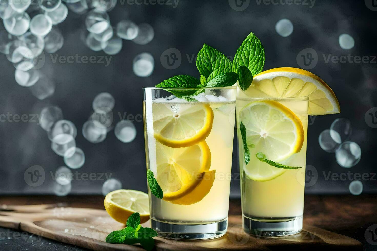 two glasses of lemonade with mint leaves and lemons. AI-Generated photo