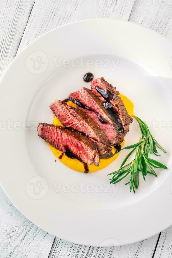 Sliced rib eye steak photo