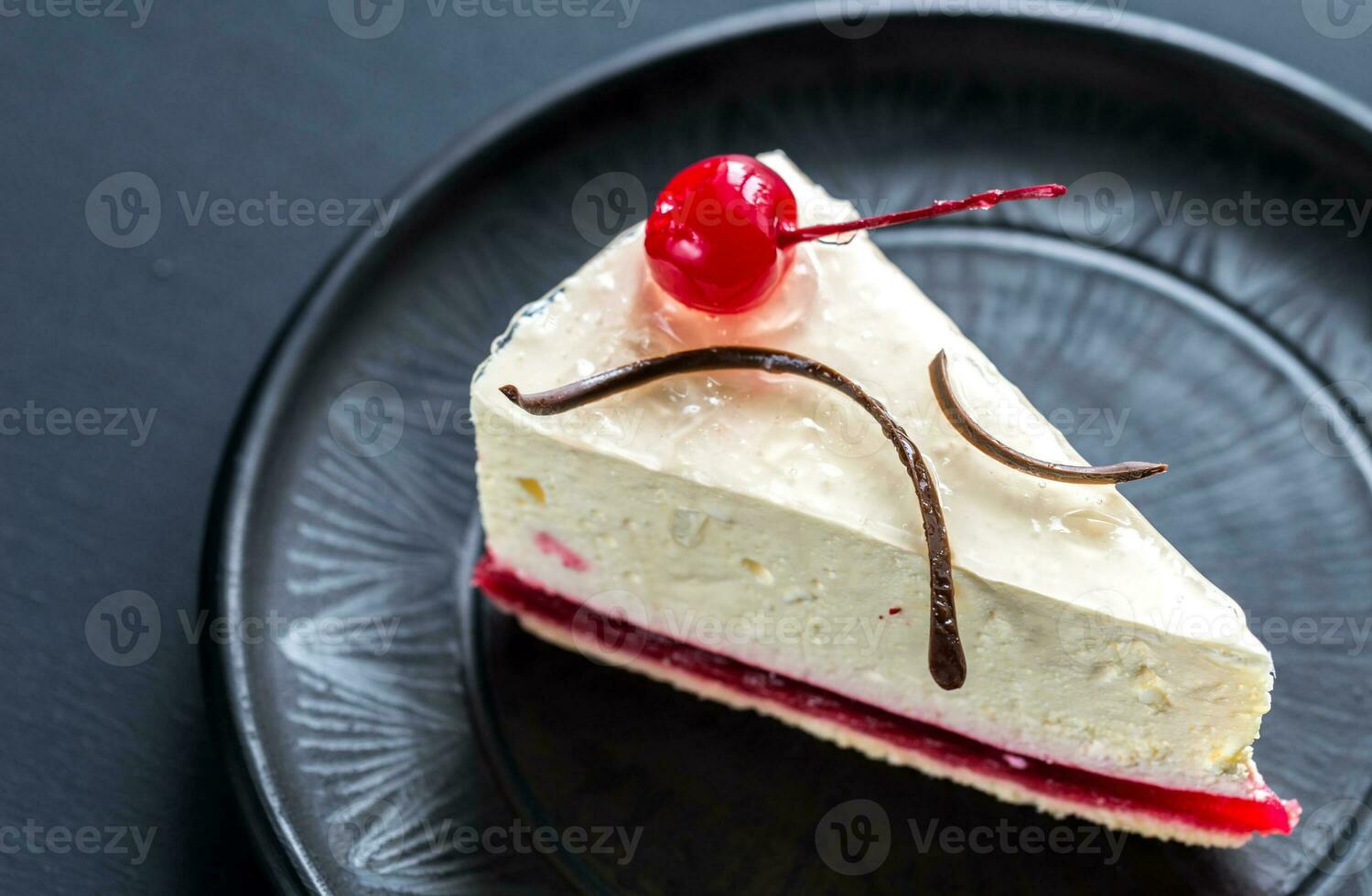 Raspberry cheesecake with sweet cherry photo