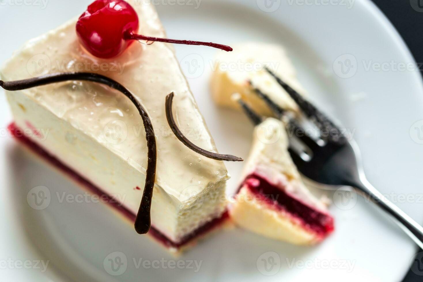 Raspberry cheesecake with sweet cherry photo