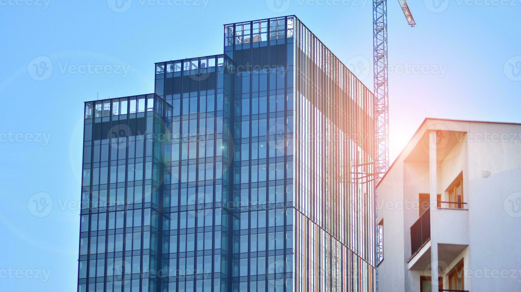 Modern building.Modern office building with facade of glass photo