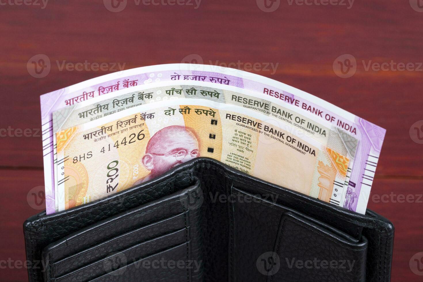 Indian rupee in the black wallet photo