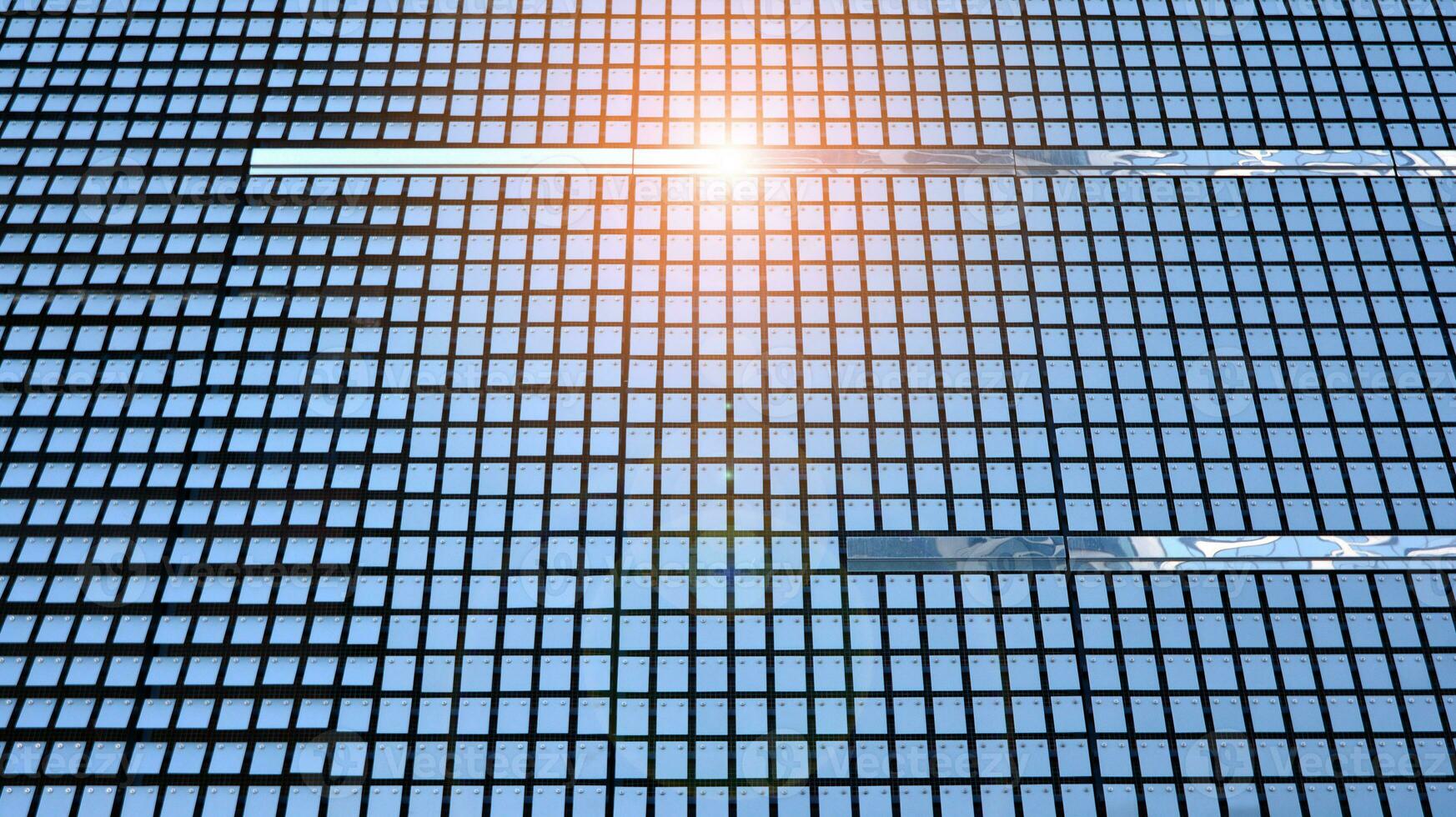 Bottom view of modern skyscrapers in business district against blue sky. Looking up at business buildings in downtown. photo