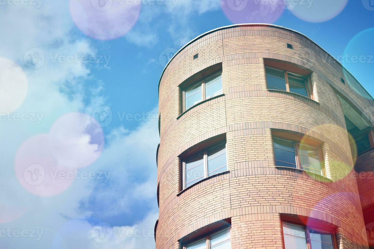 Modern apartment buildings on a sunny day with a blue sky. Facade of a modern apartment building photo