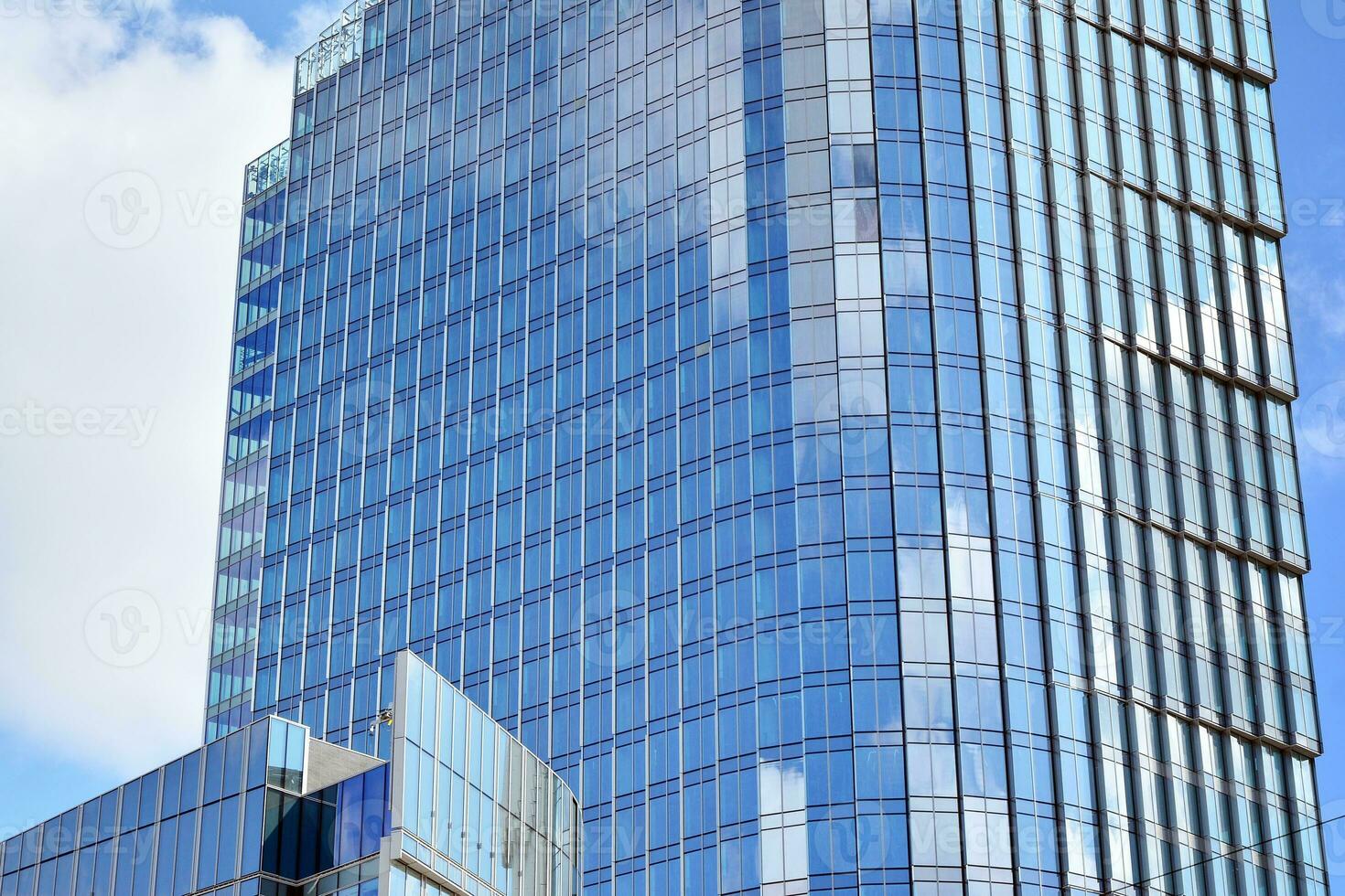 Fragment of glass and metal facade walls. Commercial office buildings ...